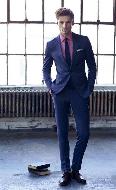 navy blue suit pink shirt.